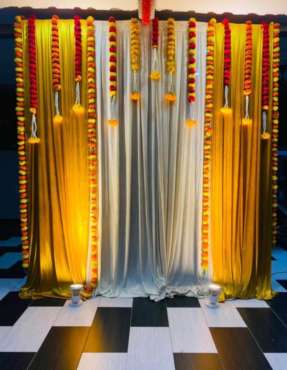 Hang garlands | GANESH PUJA DECORATION IDEAS