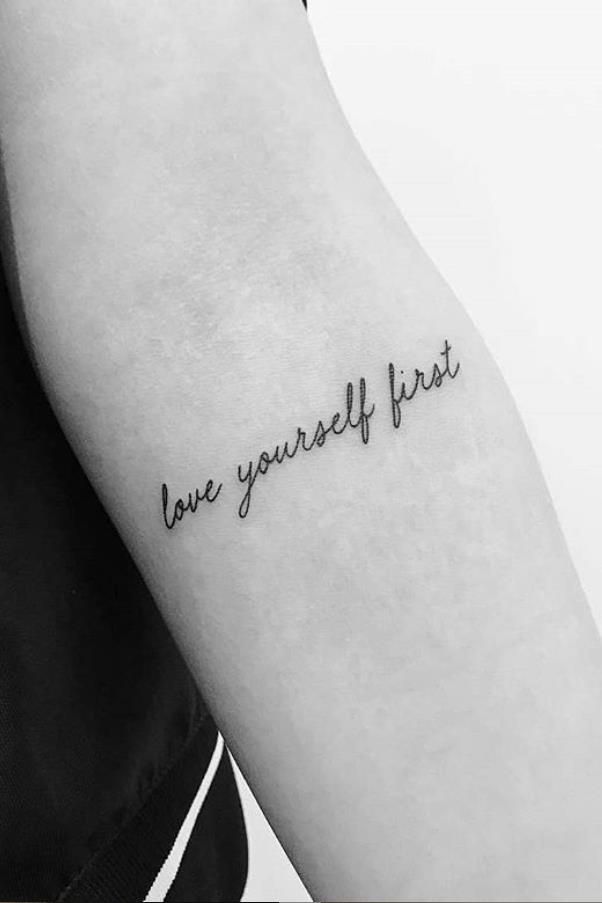 Letter-inspired simple and small tattoo design