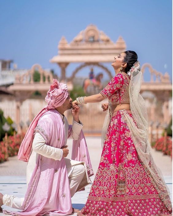 wedding couple poses for photoshoot